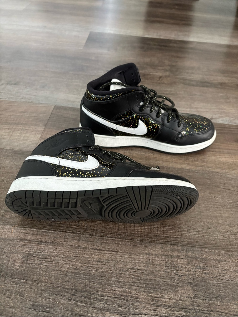 Jordan women’s Black High-Top Sneakers with White Swoosh and Gold Fleck - Picture 4 of 7